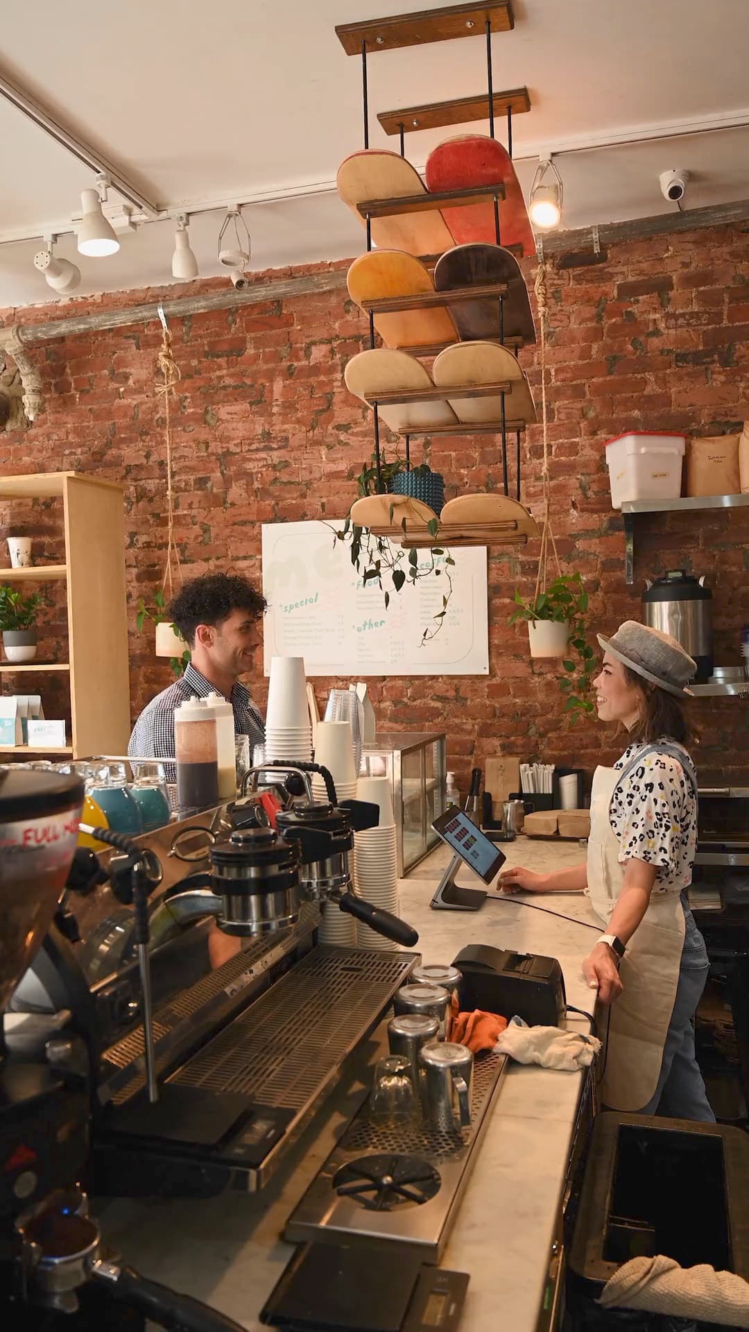 A busy coffee shop counter during the morning rush